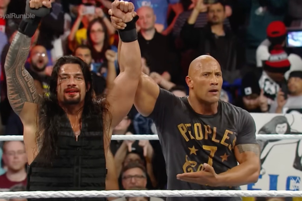When will the implied feud between Roman Reigns and The Rock come to a head?
