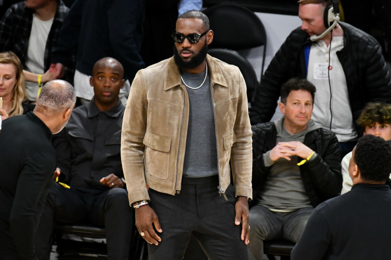 LOS ANGELES, CALIFORNIA - MARCH 22: Injured LeBron James watches a basketball game between the Los Angeles Lakers and the Phoenix Suns at Crypto.com Arena on March 22, 2023 in Los Angeles, California. (Photo by Allen Berezovsky/Getty Images)