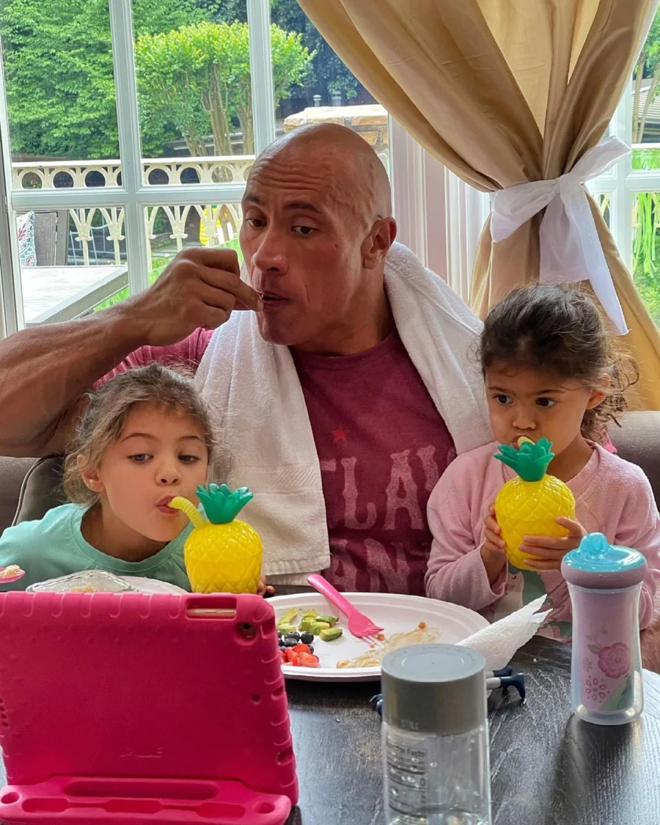 In May 2021, Johnson uploaded an Instagram snap while eating breakfast with his youngest daughters. As they munched on fruit and sipped drinks from pineapple-shaped cups, the Jumanji actor explained they were watching The Lion King "for the 8,000th time." He concluded the post with "#breakfastwithmyloves."
