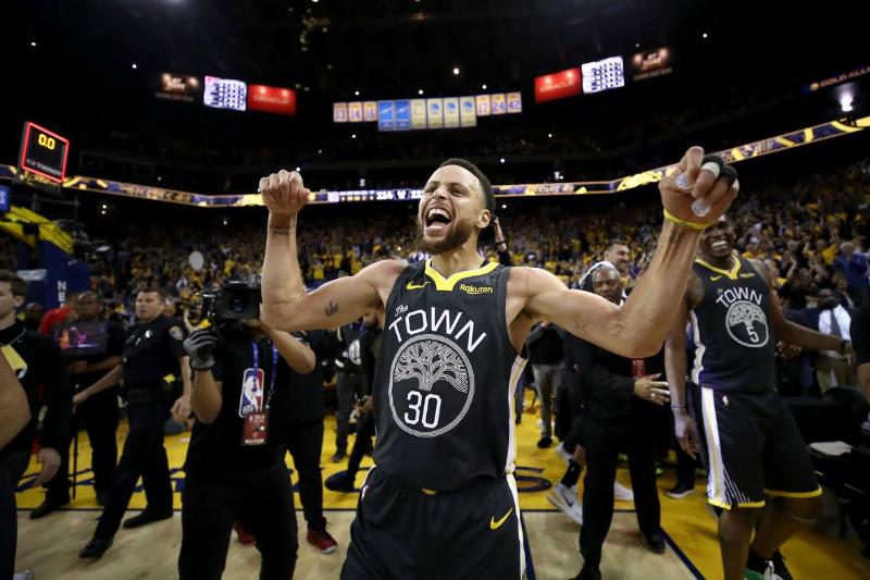 OAKLAND, CALIFORNIA - MAY 16: Stephen Curry #30 of the Golden State Warriors celebrates after defeating the Portland Trail Blazers 114-111 in game two of the NBA Western Conference Finals at ORACLE Arena on May 16, 2019 in Oakland, California. NOTE TO USER: User expressly acknowledges and agrees that, by downloading and or using this photograph, User is consenting to the terms and conditions of the Getty Images License Agreement.