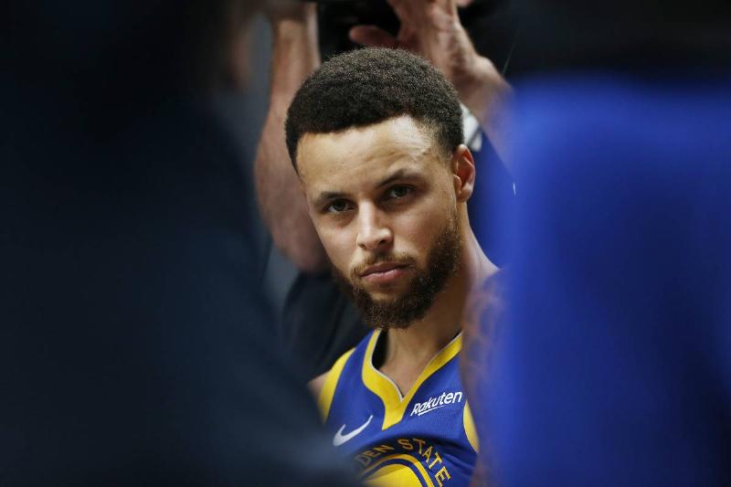 PORTLAND, OREGON - MAY 20: Stephen Curry #30 of the Golden State Warriors looks on during a timeout in game four of the NBA Western Conference Finals against the Portland Trail Blazers at Moda Center on May 20, 2019 in Portland, Oregon. NOTE TO USER: User expressly acknowledges and agrees that, by downloading and or using this photograph, User is consenting to the terms and conditions of the Getty Images License Agreement.