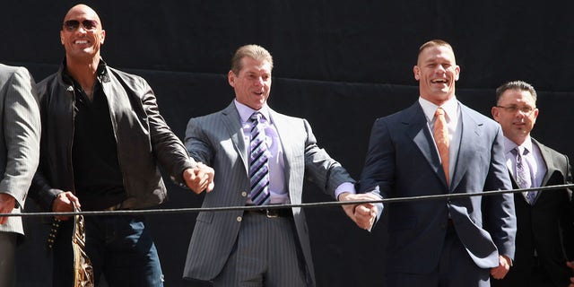 The Rock, Vince McMahon, John Cena, and Michael Cole  attend the WrestleMania 29 Press Conference at Radio City Music Hall on April 4, 2013 in New York City.  